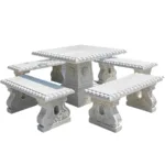 Elegant white marble dining table and bench set with carved detailing, ideal for outdoor or garden use, providing a luxurious look.
