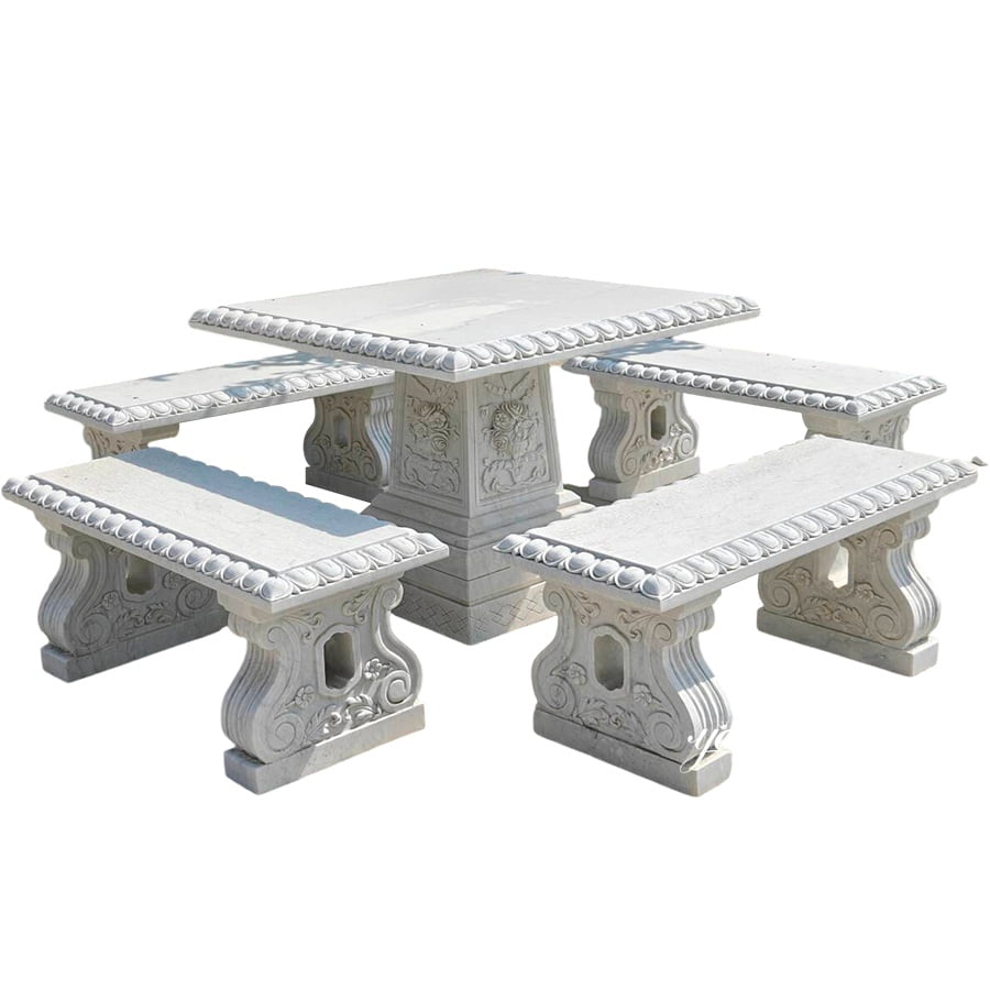 Elegant white marble dining table and bench set with carved detailing, ideal for outdoor or garden use, providing a luxurious look.