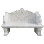 Exquisite white marble bench featuring ornate carvings of swans, intricate floral patterns, and decorative accents.
