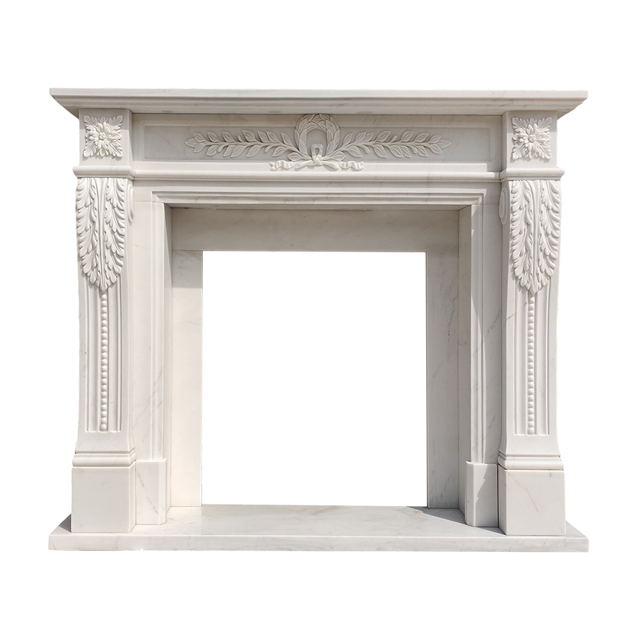 Elegant white marble fireplace mantel featuring intricate carved details, including floral and leaf patterns, on a bright background.
