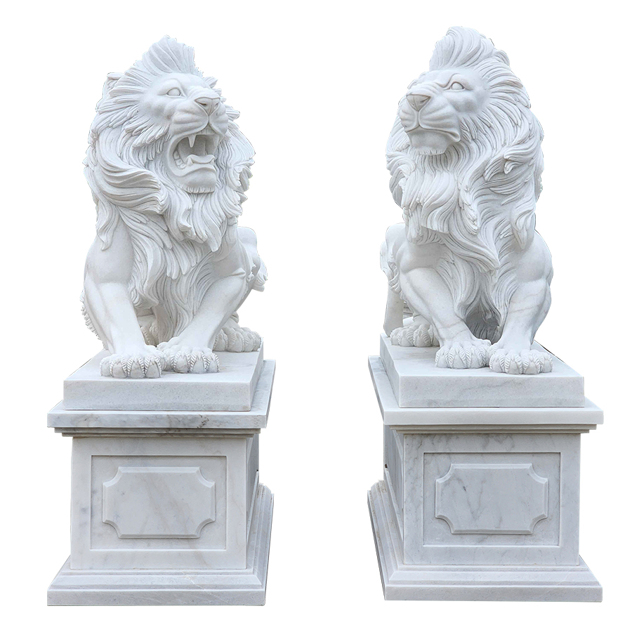 Two detailed white marble lion statues on intricately carved pedestals; one roaring and the other with a calm expression.