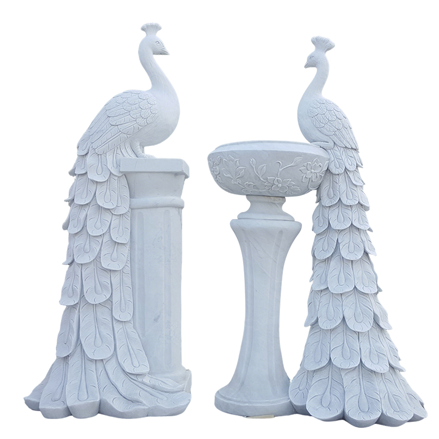 Pair of white marble peacock statues with detailed feathers standing on decorative bases, showcasing craftsmanship.