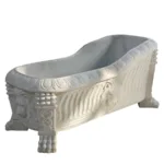 Luxurious carved marble bathtub featuring detailed lion head motifs on the sides, intricate patterns, and lion paw feet.