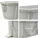 Detailed view of a decorative marble planter featuring intricate lion head, drapery, and column carvings with elegant designs.
