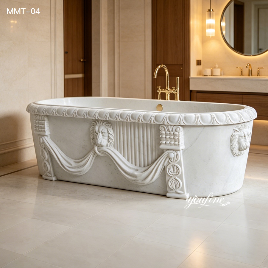 Elegant white marble bathtub with intricate carvings featuring lion motifs and draped details, placed in a high-end bathroom setting.