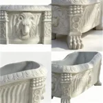 Exquisite white marble bathtub with intricate lion head carvings, decorative patterns, and ornate claw-foot design.