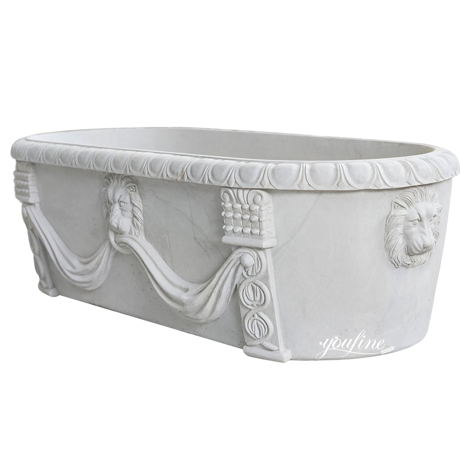 Elegant marble planter with detailed lion reliefs and draped garland motifs, showcasing intricate craftsmanship.