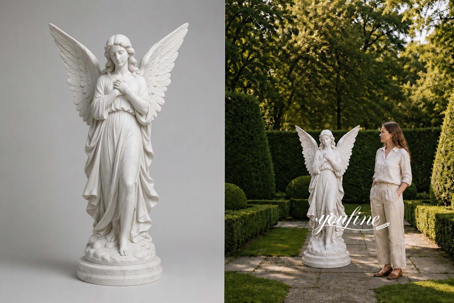 A detailed white marble angel statue with folded hands on a decorative base, displayed in a manicured garden alongside a woman for scale.
