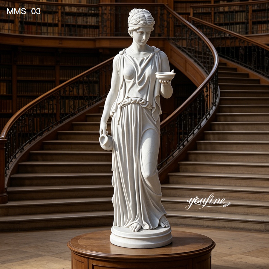 Exquisitely carved marble statue of a goddess holding a cup and jug, set in a grand library with wooden spiral stairs.