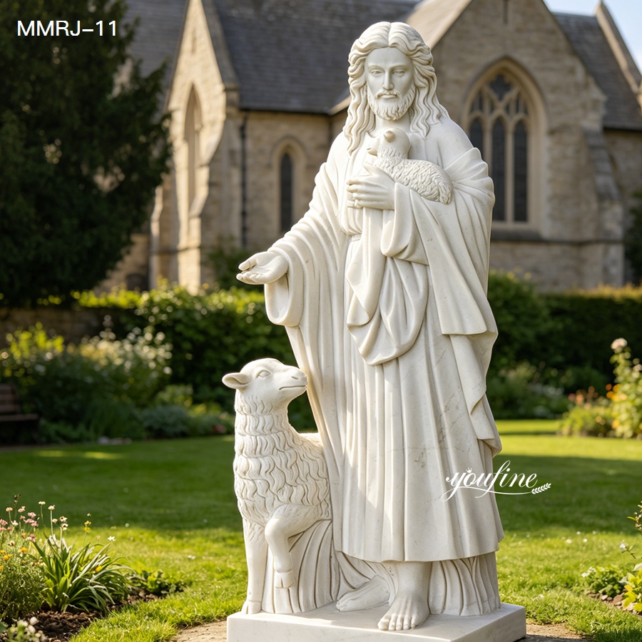 A marble sculpture of Jesus holding a lamb and standing with a sheep in a serene church garden, with detailed craftsmanship.