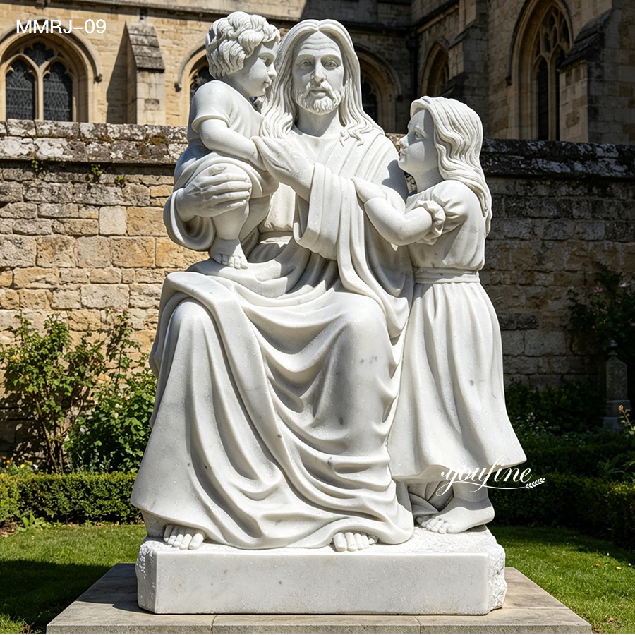 Hand-carved white marble statue of Jesus with two children in an outdoor church garden.