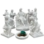 Set of intricately carved marble sculptures of Roman figures, including a central seated figure surrounded by attendants, with a small fountain in front.