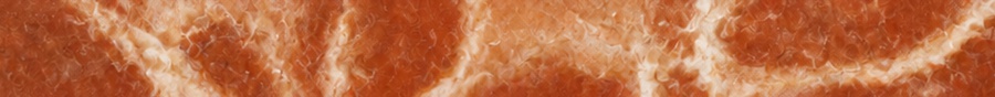 Close-up of red marble surface showcasing natural vein patterns and rich textured details. Ideal for elegant interior designs.