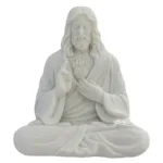Intricately carved marble statue of the Sacred Heart seated with hand gestures conveying blessing and serenity.